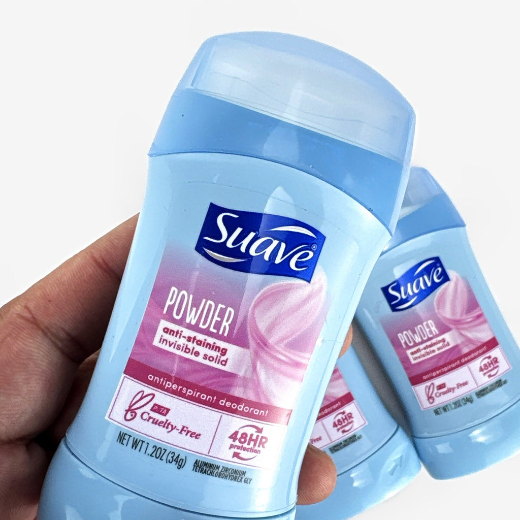 Three-pack of Suave invisible solid travel size powder antiperspirant deodorant sticks.