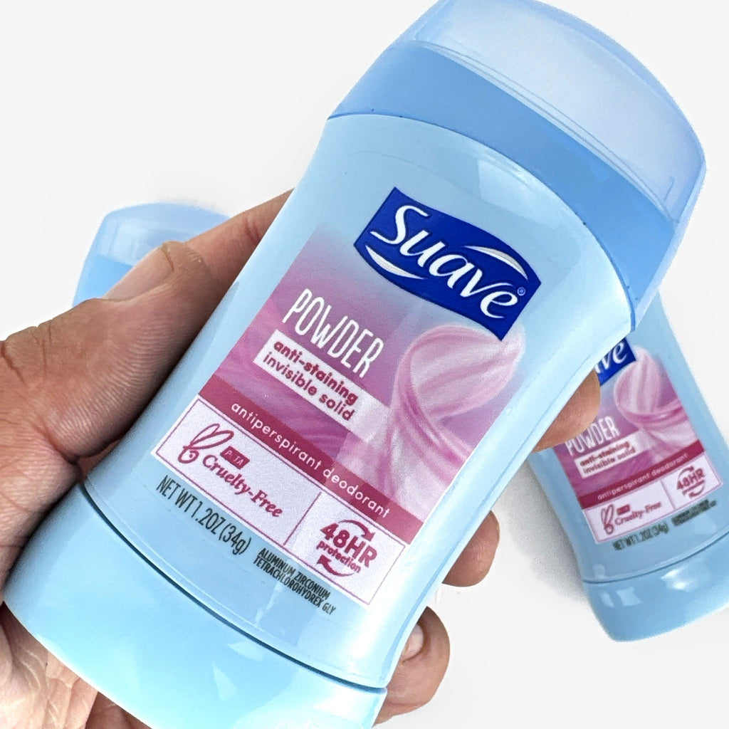 Three-pack of Suave invisible solid travel size powder antiperspirant deodorant sticks.