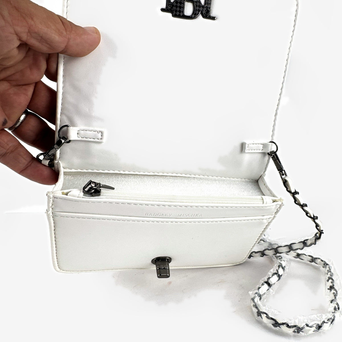 Badgley Mischka white quilted faux leather crossbody bag with gunmetal chain strap