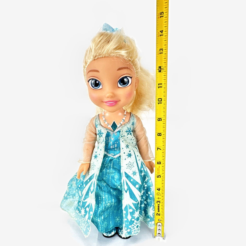 Jakks Pacific Disney Frozen Snow Glow Elsa 14-inch toddler doll wearing ice gown and glitter shoes
