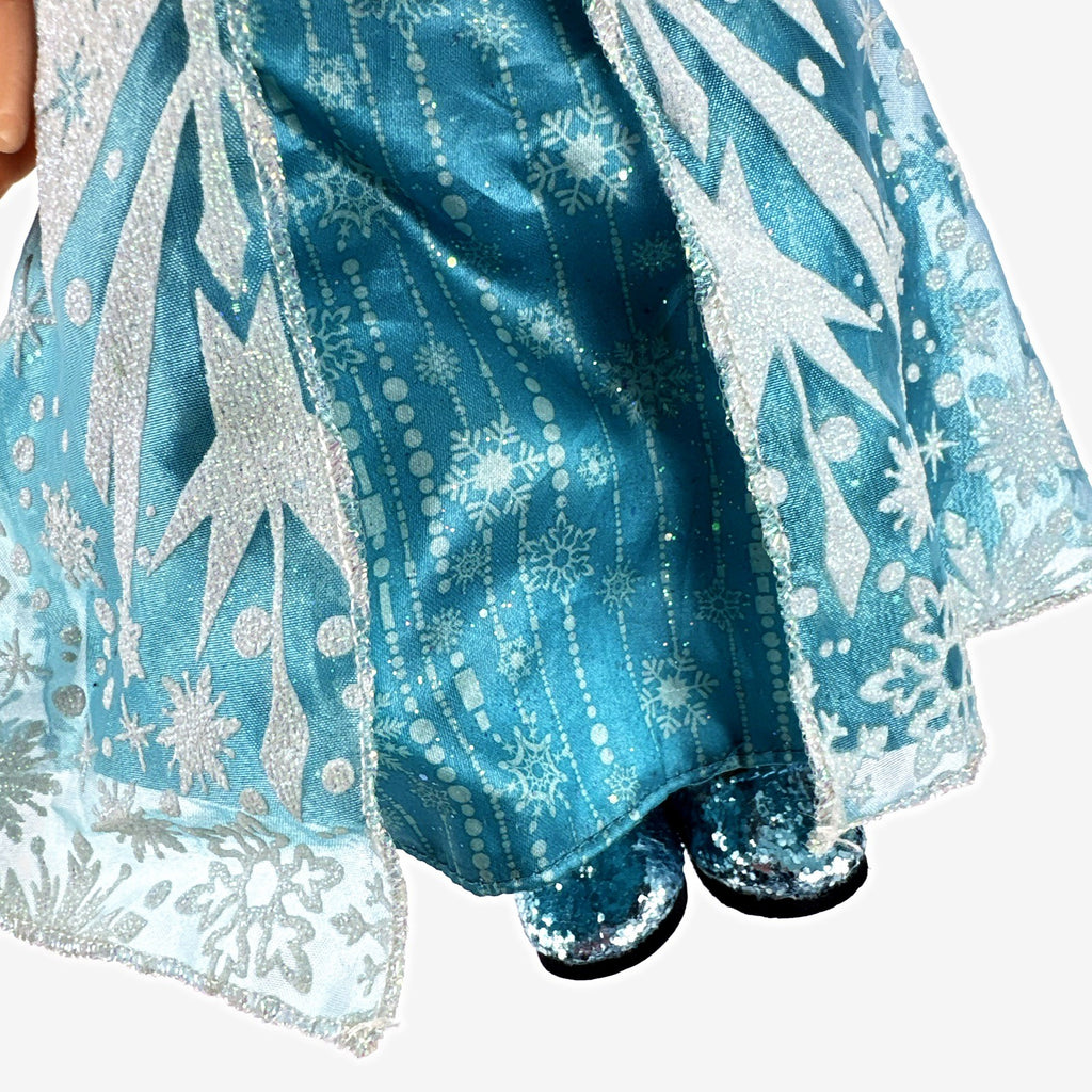 Jakks Pacific Disney Frozen Snow Glow Elsa 14-inch toddler doll wearing ice gown and glitter shoes