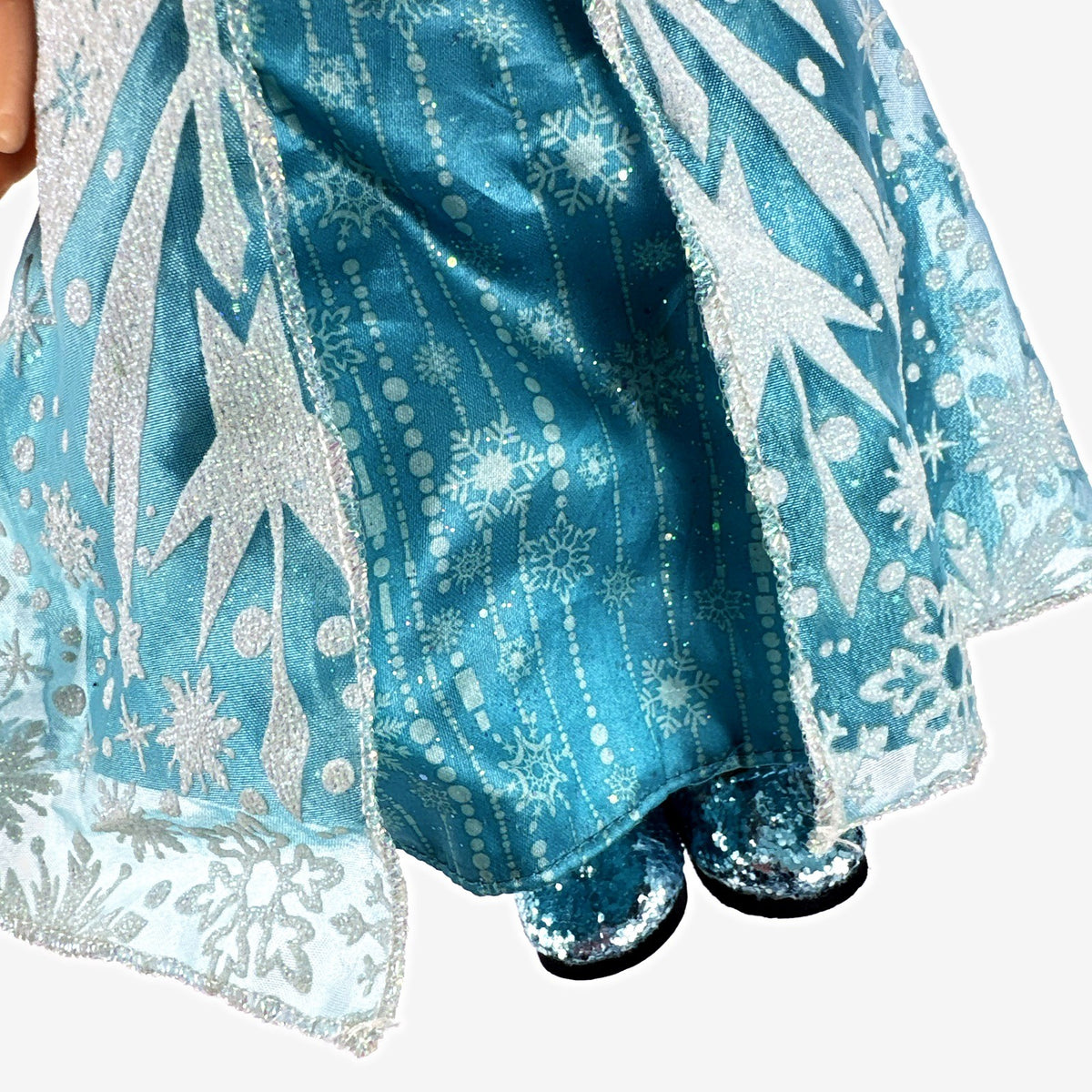 Jakks Pacific Disney Frozen Snow Glow Elsa 14-inch toddler doll wearing ice gown and glitter shoes