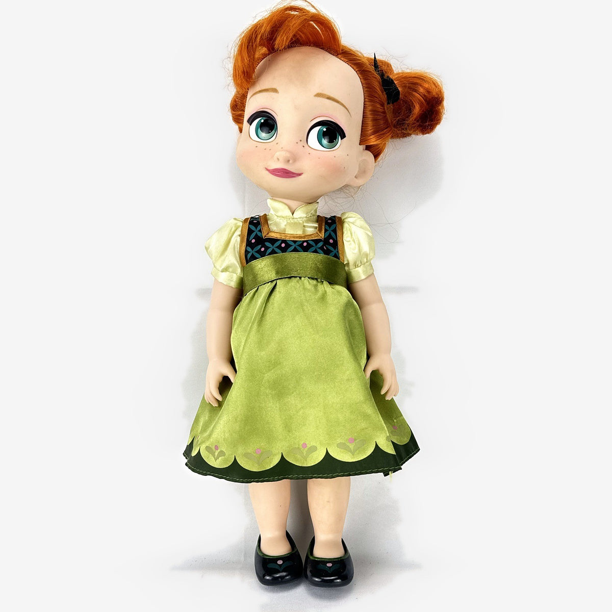 Disney Animators' Collection 16-inch Anna vinyl doll in green dress