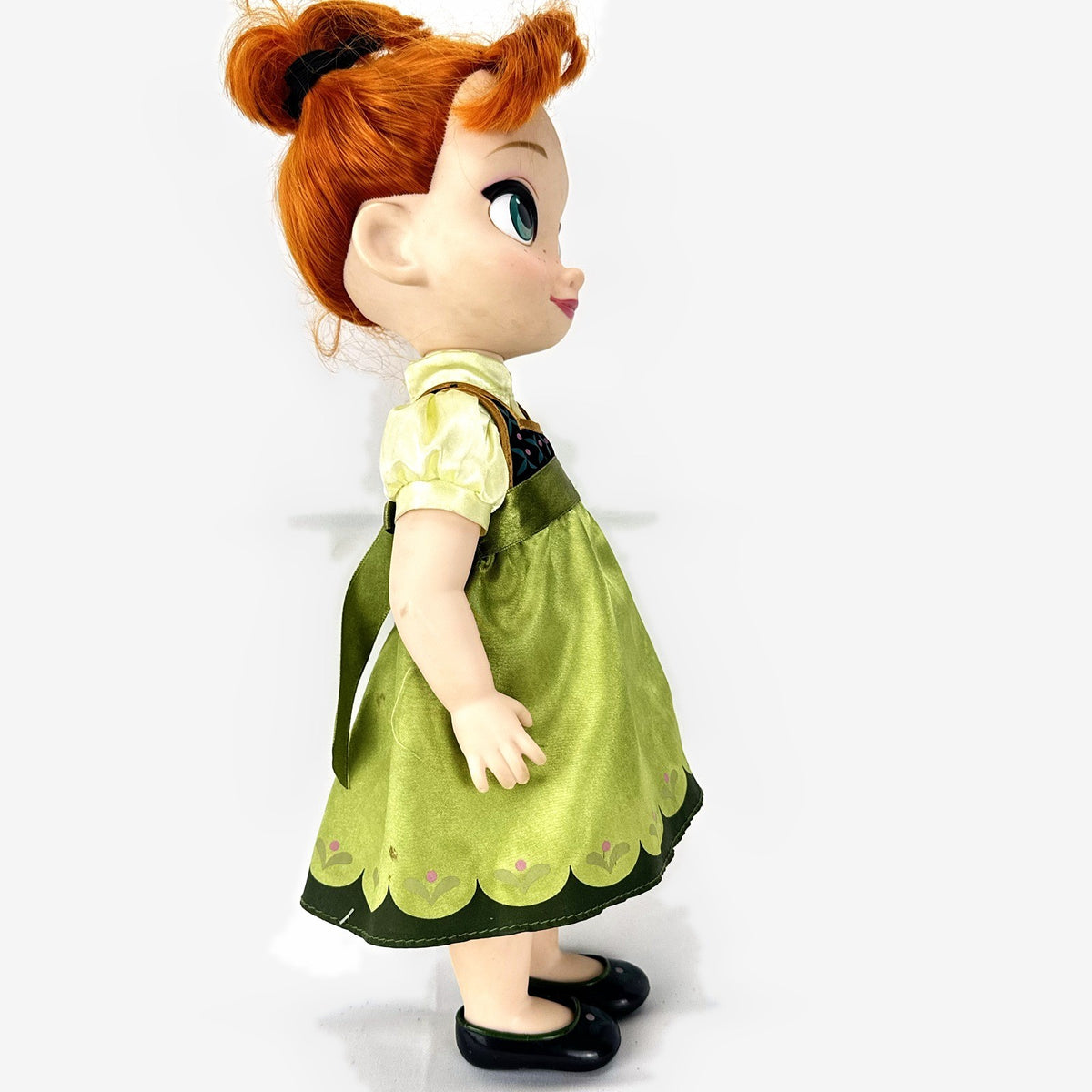 Disney Animators' Collection 16-inch Anna vinyl doll in green dress