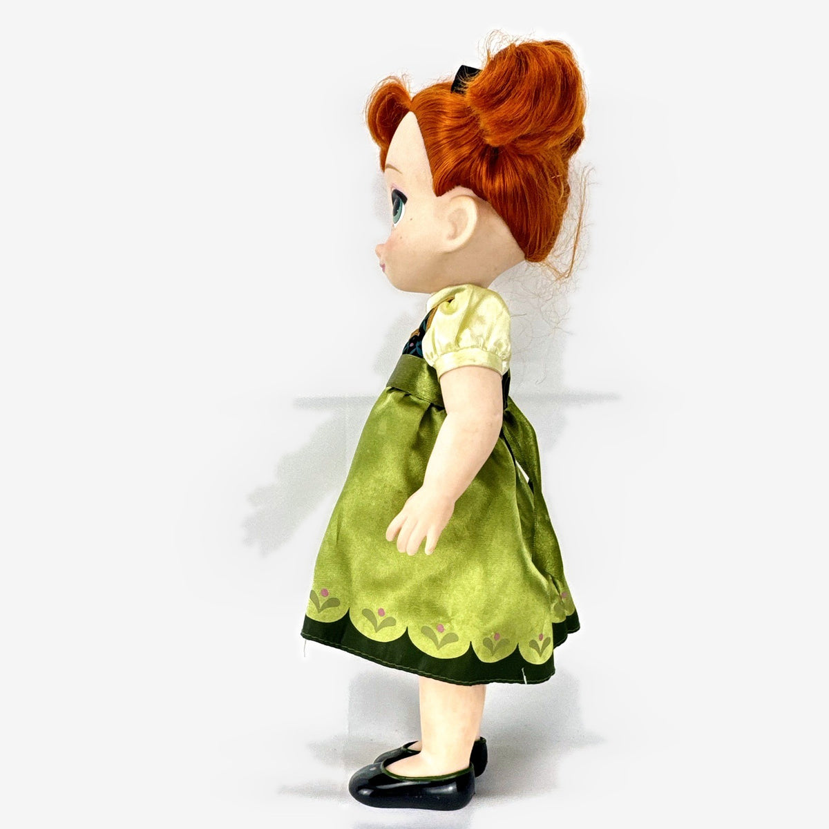 Disney Animators' Collection 16-inch Anna vinyl doll in green dress