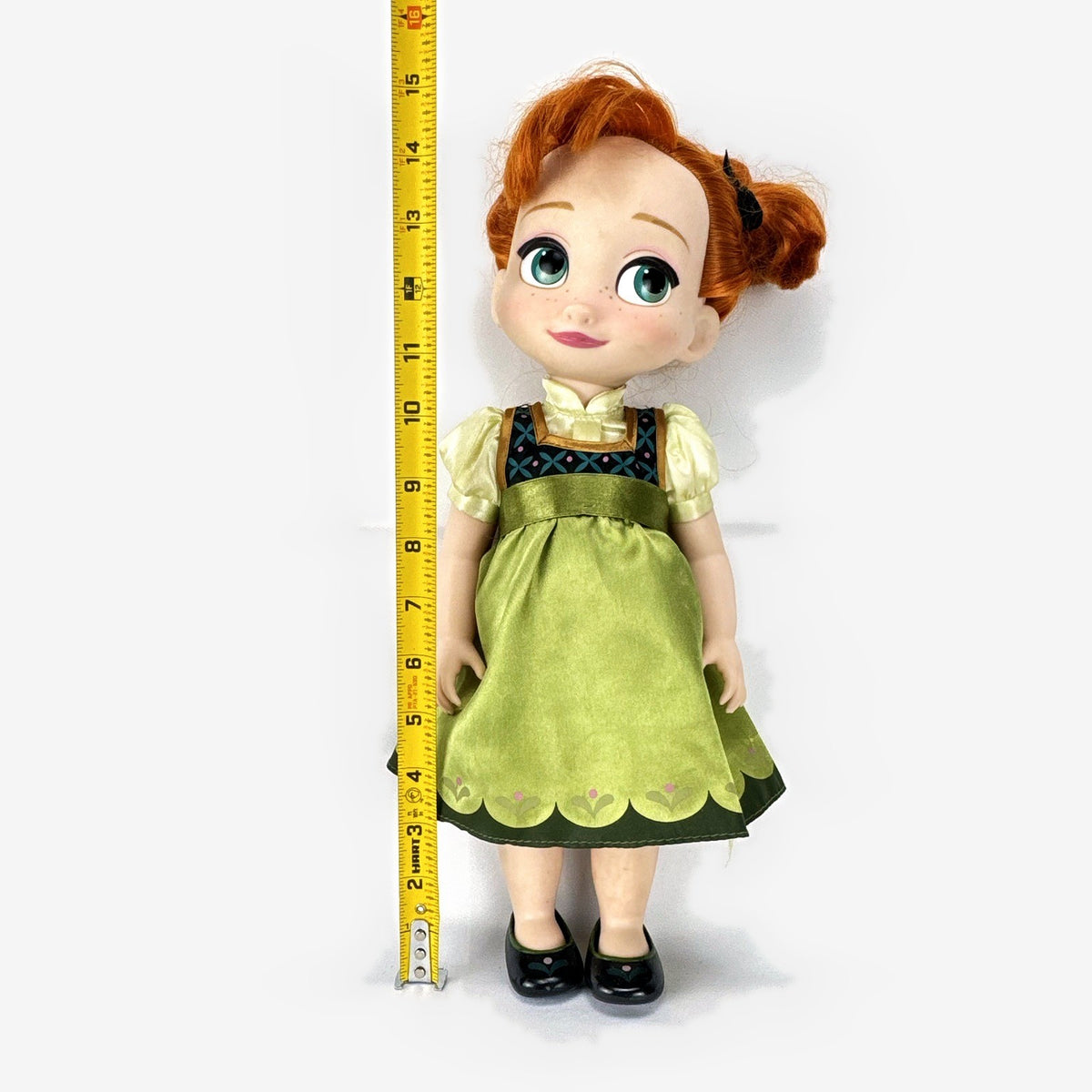 Disney Animators' Collection 16-inch Anna vinyl doll in green dress