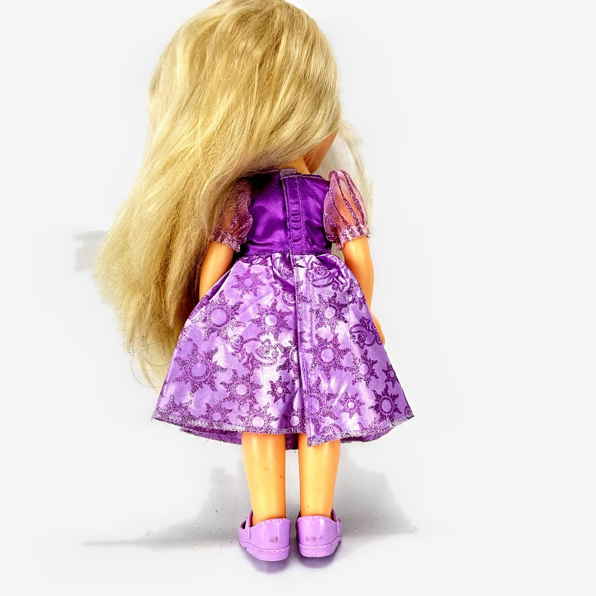 Jakks Pacific Disney Princess Rapunzel 13-inch toddler vinyl doll in purple glitter dress