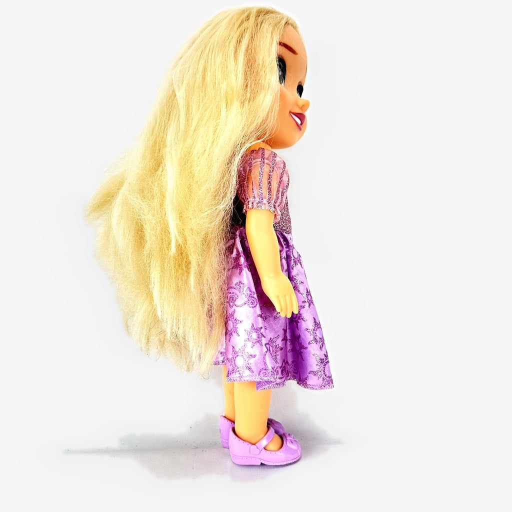 Jakks Pacific Disney Princess Rapunzel 13-inch toddler vinyl doll in purple glitter dress