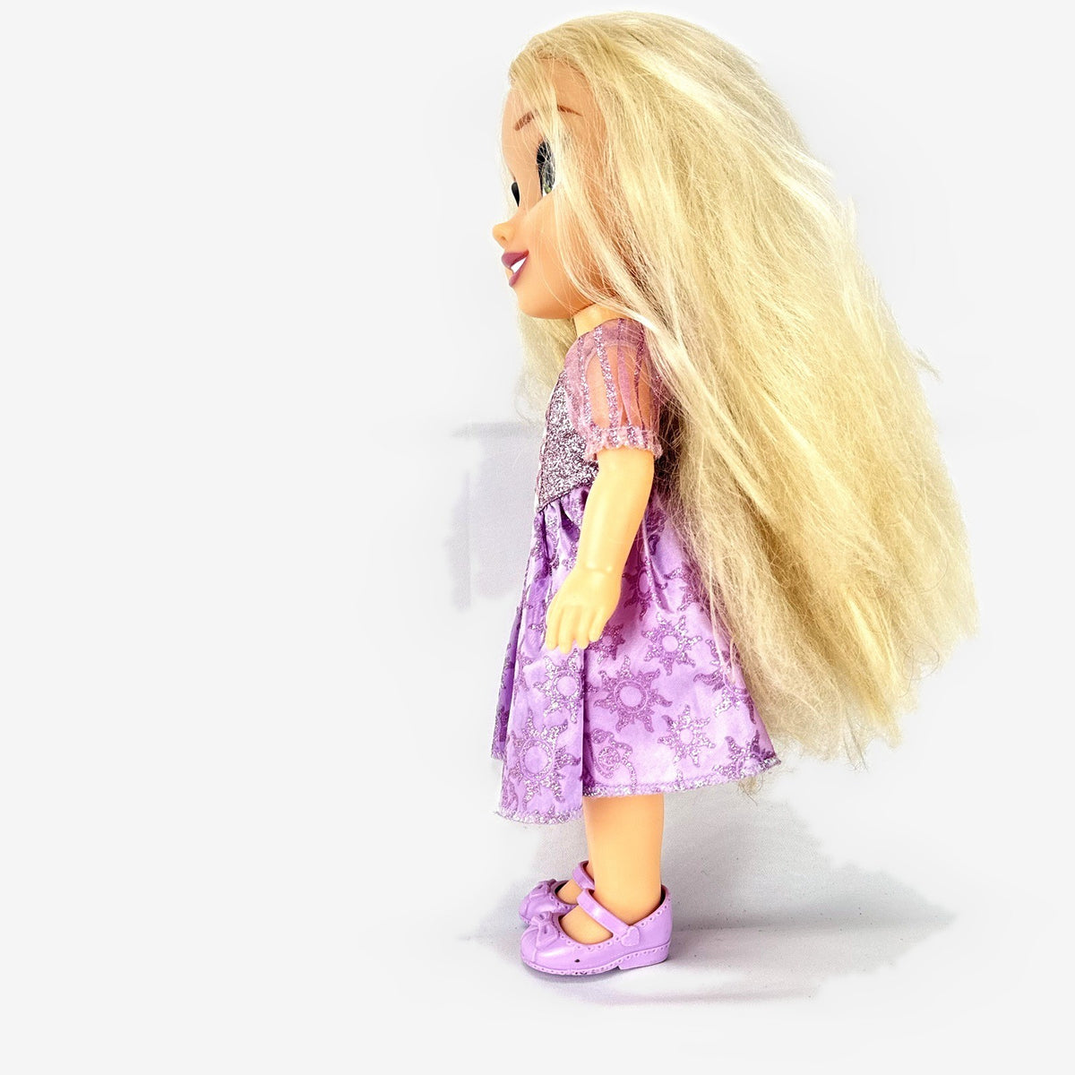 Jakks Pacific Disney Princess Rapunzel 13-inch toddler vinyl doll in purple glitter dress