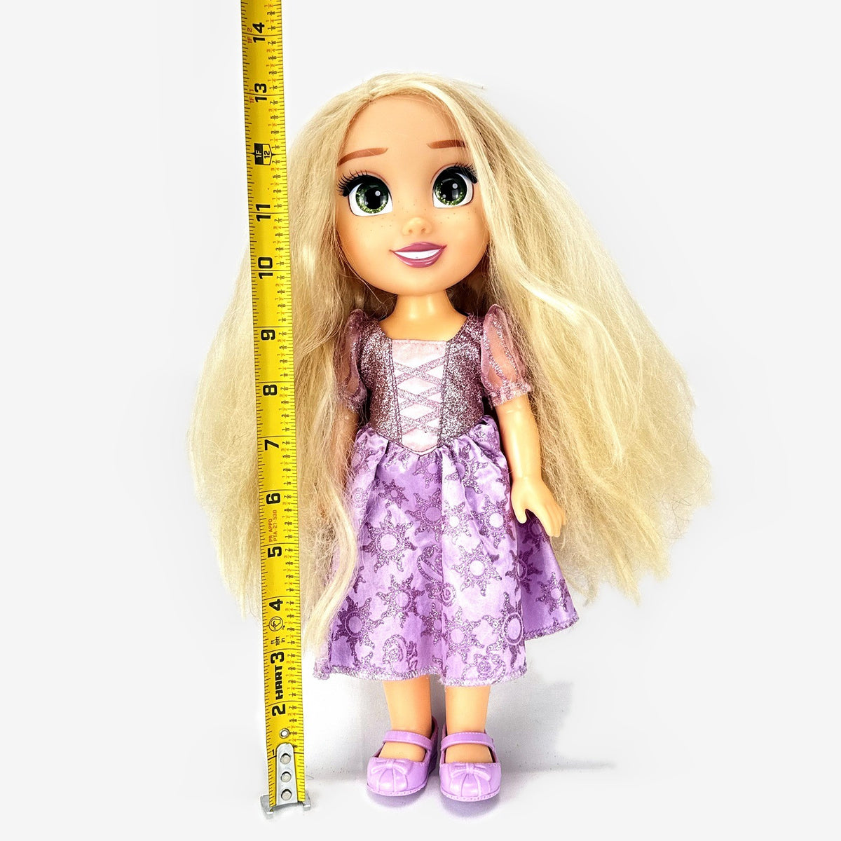 Jakks Pacific Disney Princess Rapunzel 13-inch toddler vinyl doll in purple glitter dress