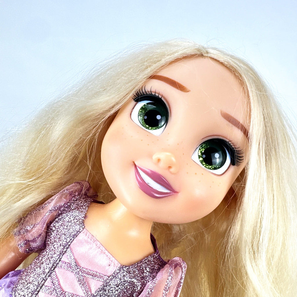 Jakks Pacific Disney Princess Rapunzel 13-inch toddler vinyl doll in purple glitter dress