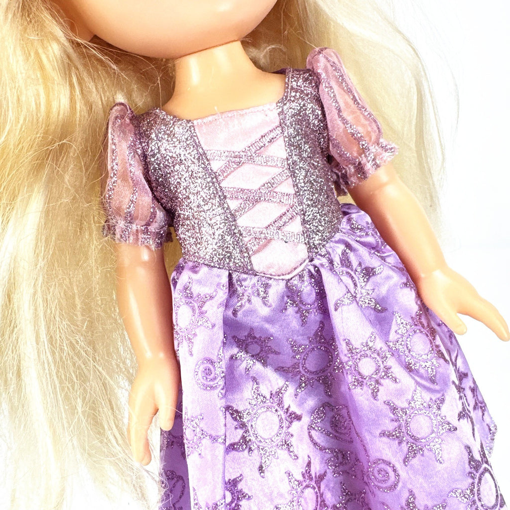 Jakks Pacific Disney Princess Rapunzel 13-inch toddler vinyl doll in purple glitter dress