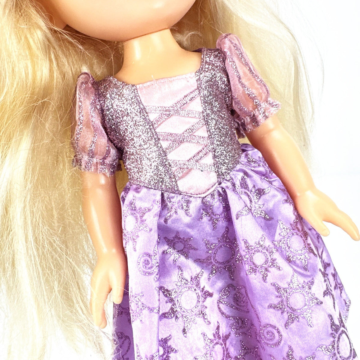Jakks Pacific Disney Princess Rapunzel 13-inch toddler vinyl doll in purple glitter dress