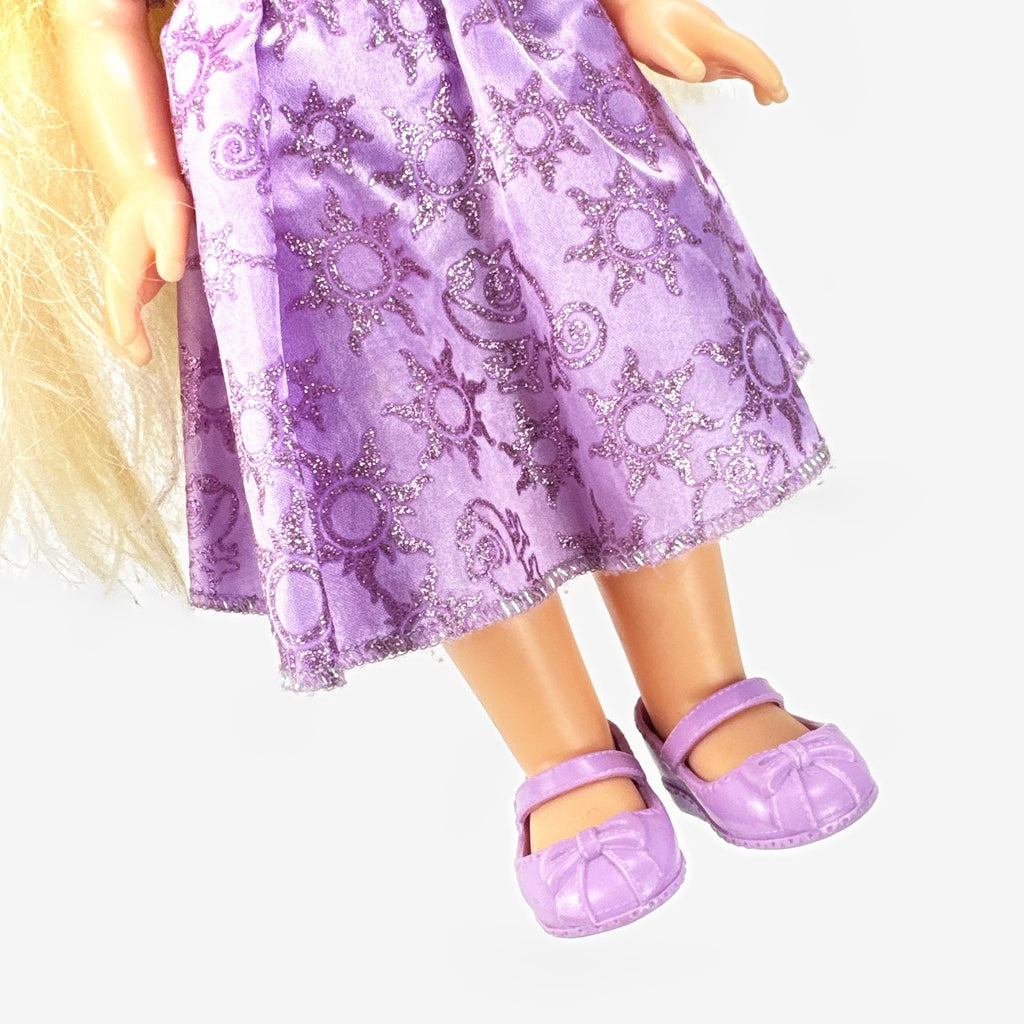 Jakks Pacific Disney Princess Rapunzel 13-inch toddler vinyl doll in purple glitter dress