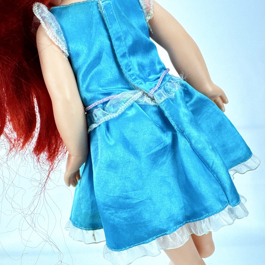 Jakks Pacific Disney Princess Ariel 14-inch toddler doll wearing seafoam green dress