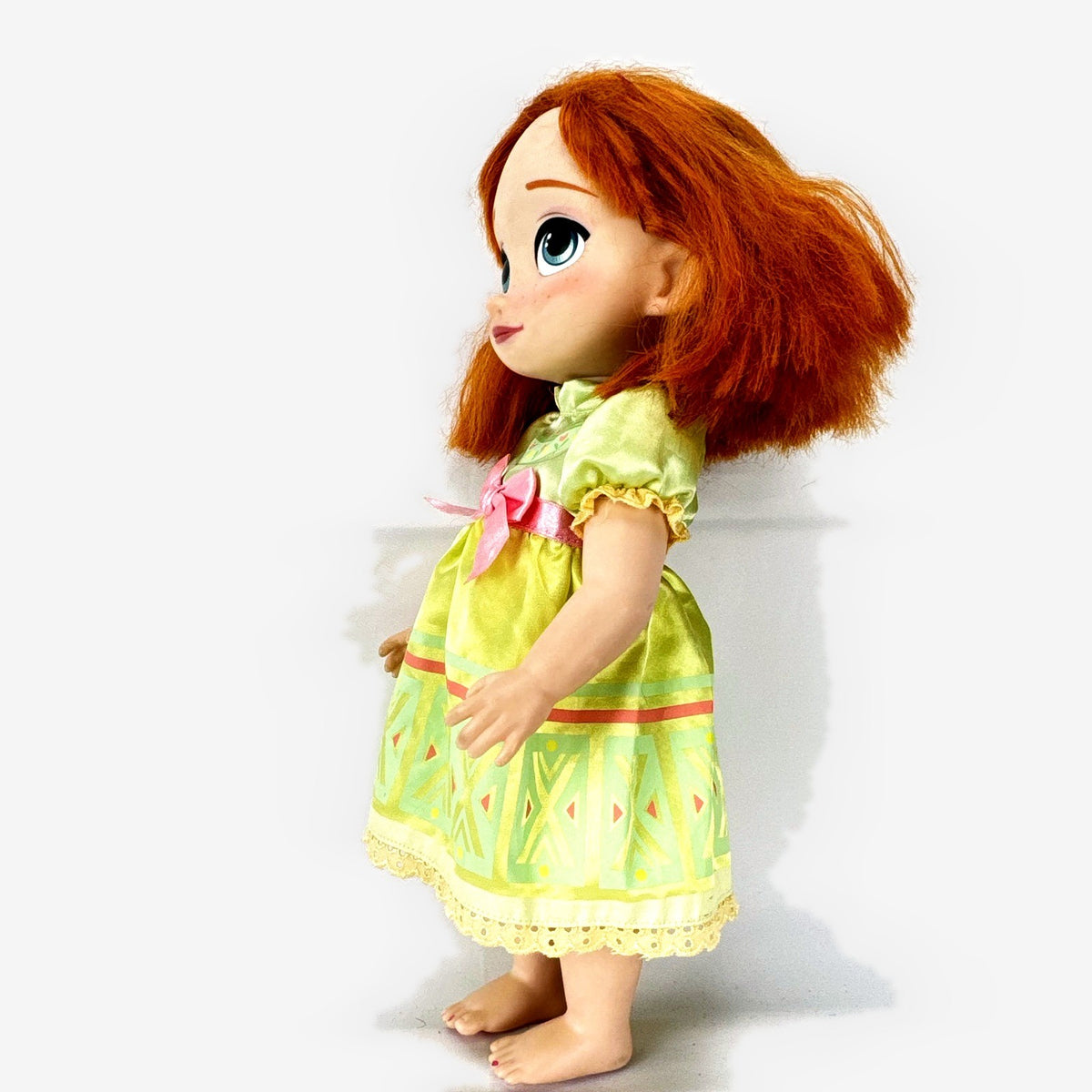 Disney Store Frozen Animators' Collection 16-inch Anna toddler doll in green dress with rooted red hair