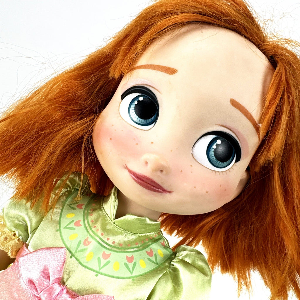 Disney Store Frozen Animators' Collection 16-inch Anna toddler doll in green dress with rooted red hair