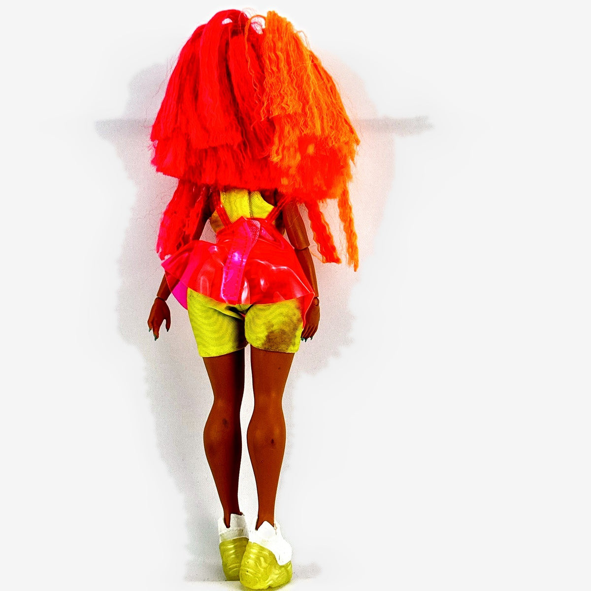 MGA LOL Surprise OMG Neonlicious fashion doll with split-dyed neon hair and layered outfit