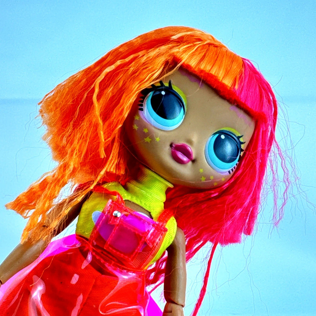 MGA LOL Surprise OMG Neonlicious fashion doll with split-dyed neon hair and layered outfit