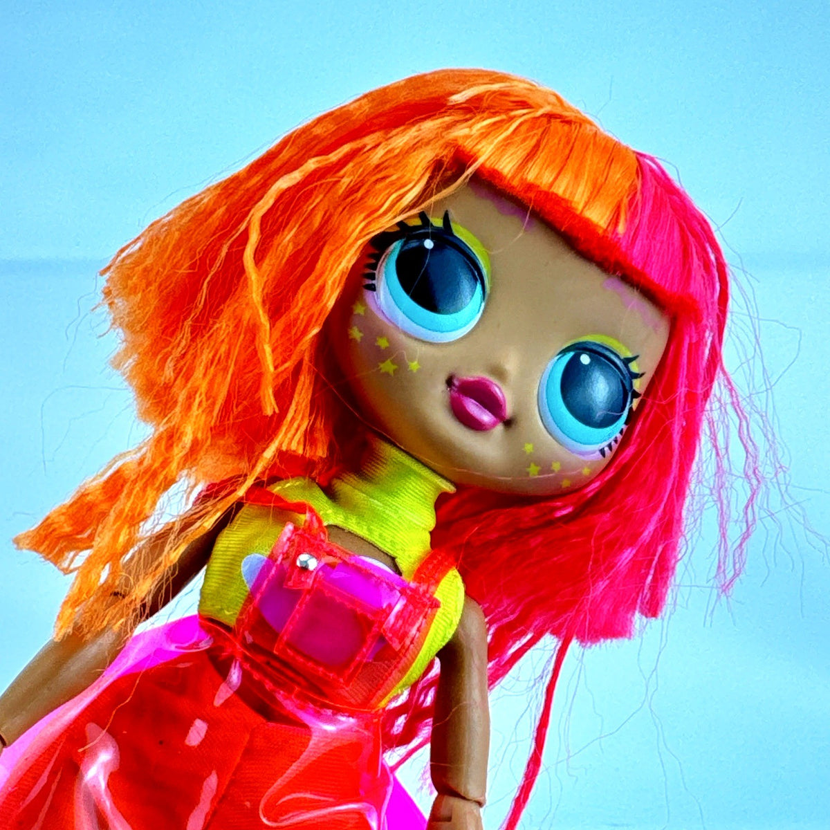 MGA LOL Surprise OMG Neonlicious fashion doll with split-dyed neon hair and layered outfit