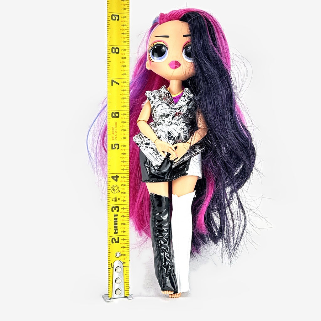 L.O.L. Surprise! OMG Movie Magic Ms. Direct fashion doll wearing newspaper comic print outfit and split-tone hair