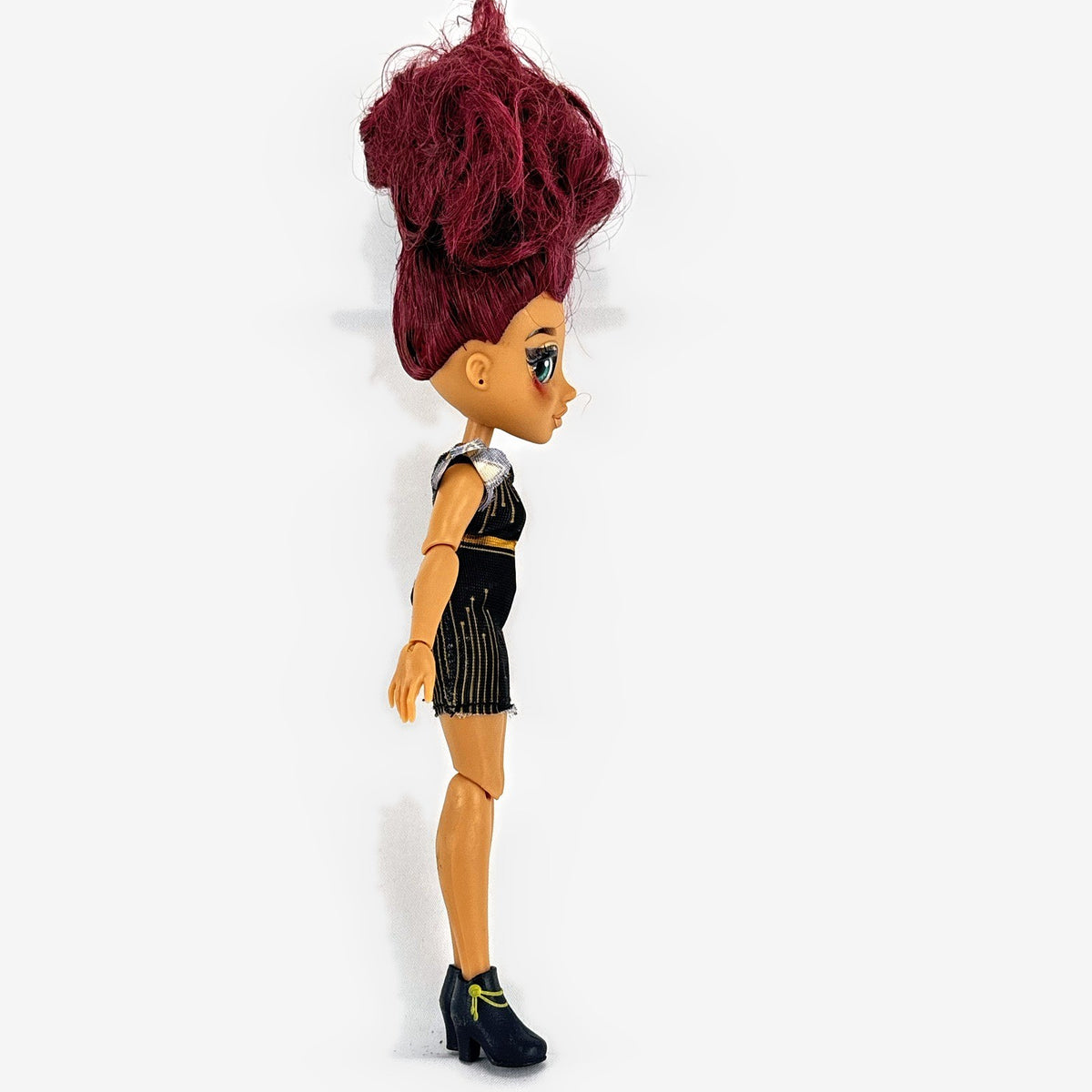 Moose Toys FailFix Dance Stylz fashion doll wearing black and gold dress with burgundy updo