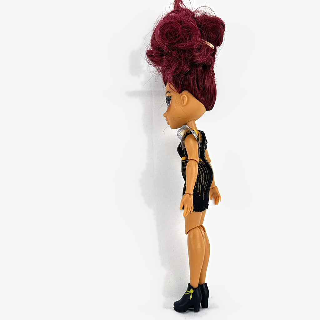 Moose Toys FailFix Dance Stylz fashion doll wearing black and gold dress with burgundy updo