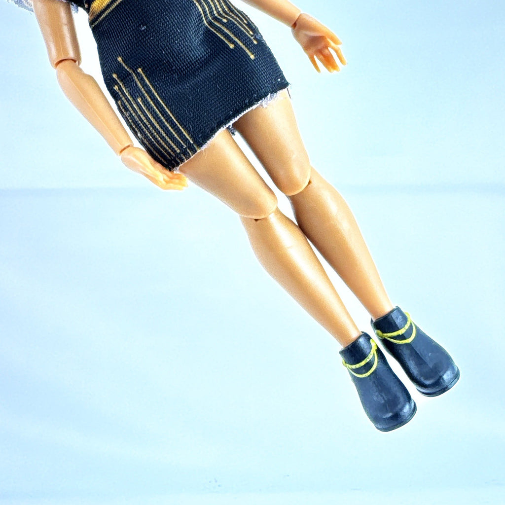 Moose Toys FailFix Dance Stylz fashion doll wearing black and gold dress with burgundy updo