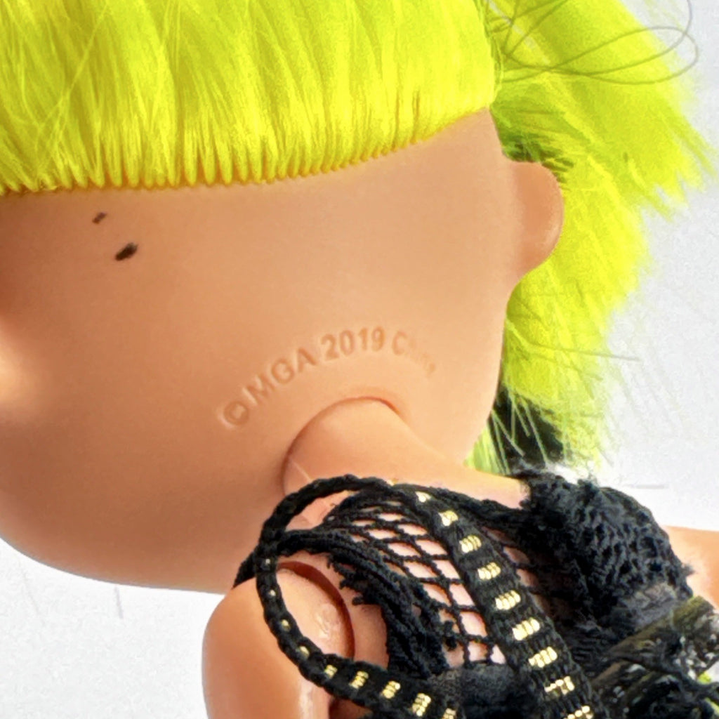 MGA L.O.L. Surprise! OMG Remix Bhad Gurl 10-inch fashion doll with neon yellow hair and caution tape outfit