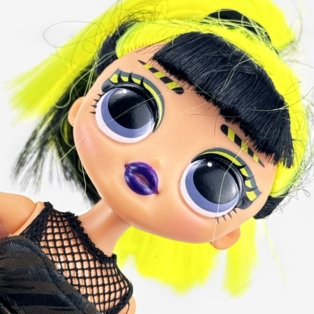 MGA L.O.L. Surprise! OMG Remix Bhad Gurl 10-inch fashion doll with neon yellow hair and caution tape outfit