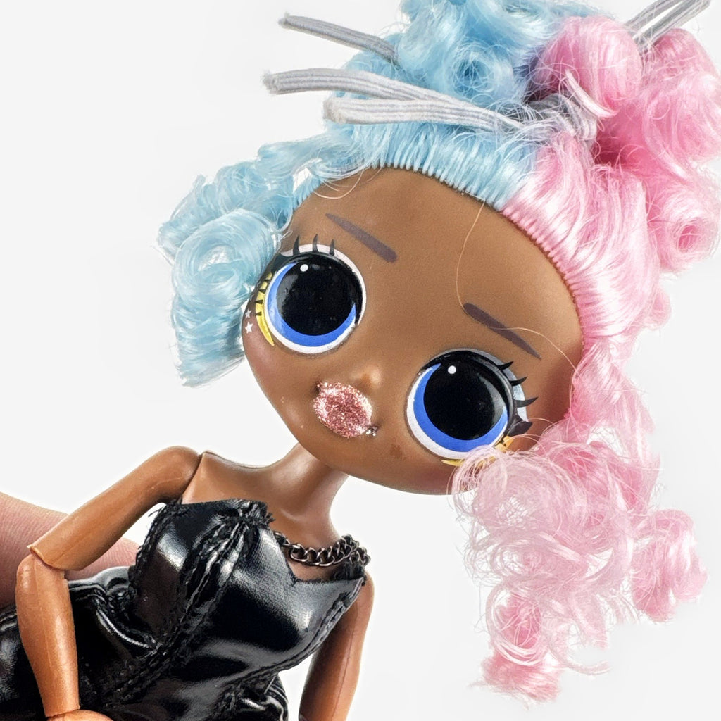 MGA L.O.L. Surprise! OMG Miss Royale 10-inch articulated doll with split pink and blue curls in a black corset dress
