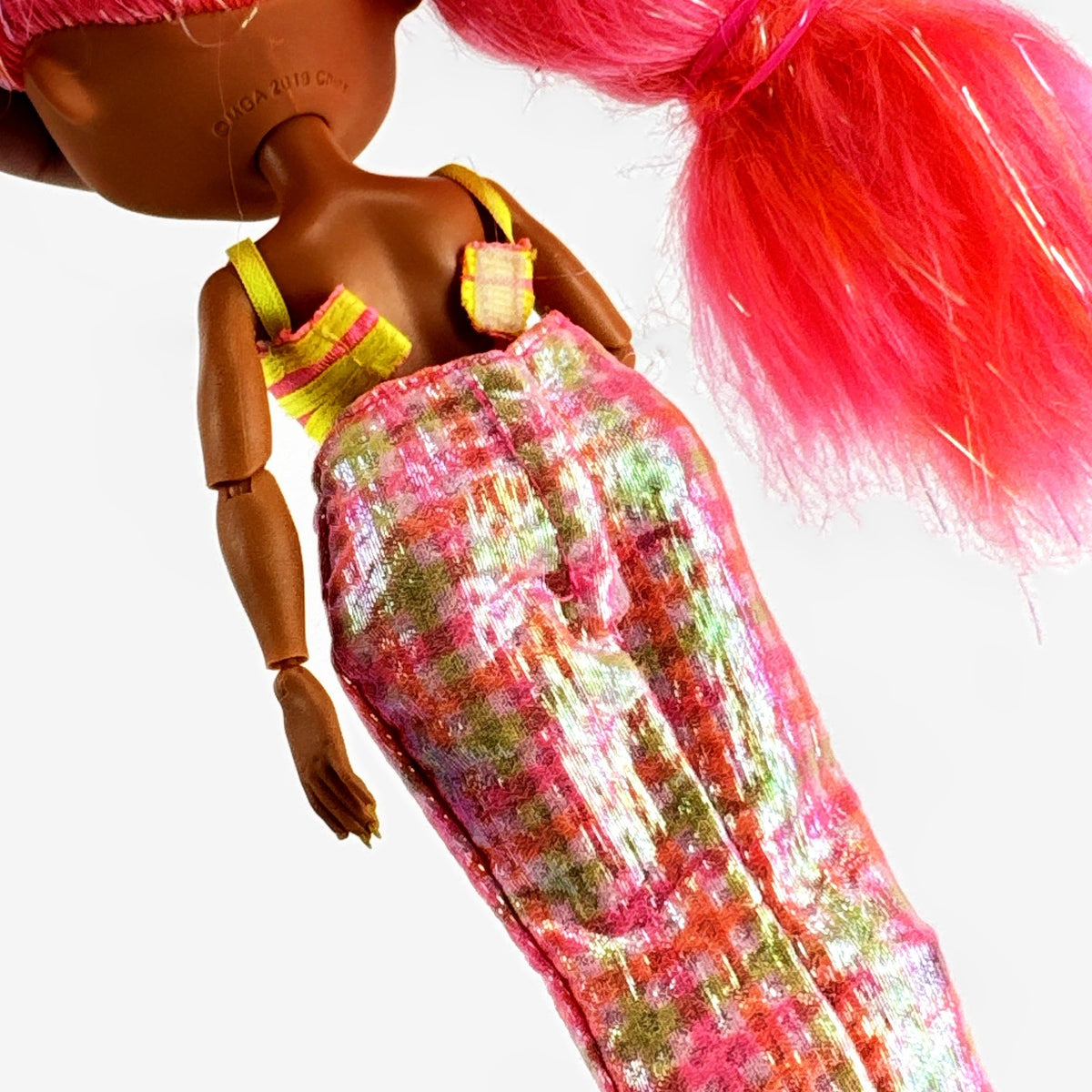 MGA L.O.L. Surprise! O.M.G. Lights Dazzle 10-inch doll in neon two-piece outfit with pink wedge boots