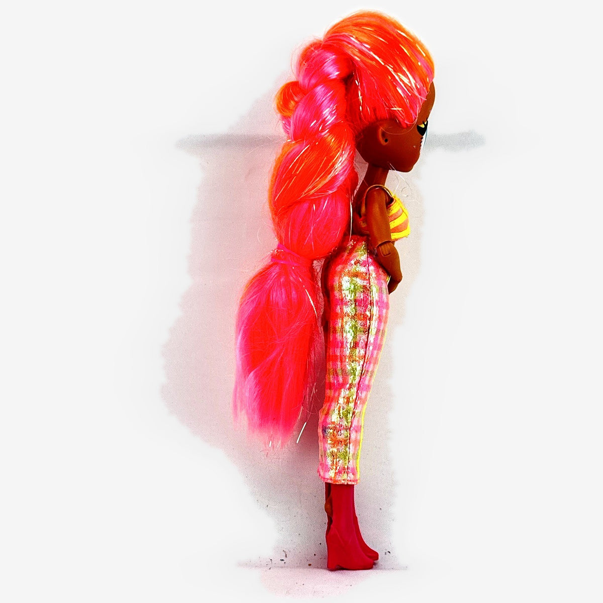 MGA L.O.L. Surprise! O.M.G. Lights Dazzle 10-inch doll in neon two-piece outfit with pink wedge boots