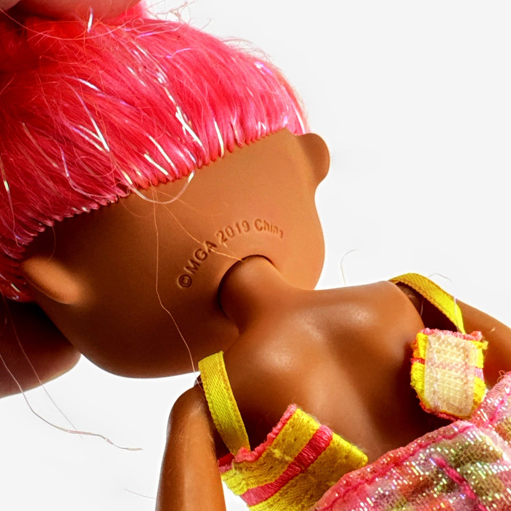 MGA L.O.L. Surprise! O.M.G. Lights Dazzle 10-inch doll in neon two-piece outfit with pink wedge boots