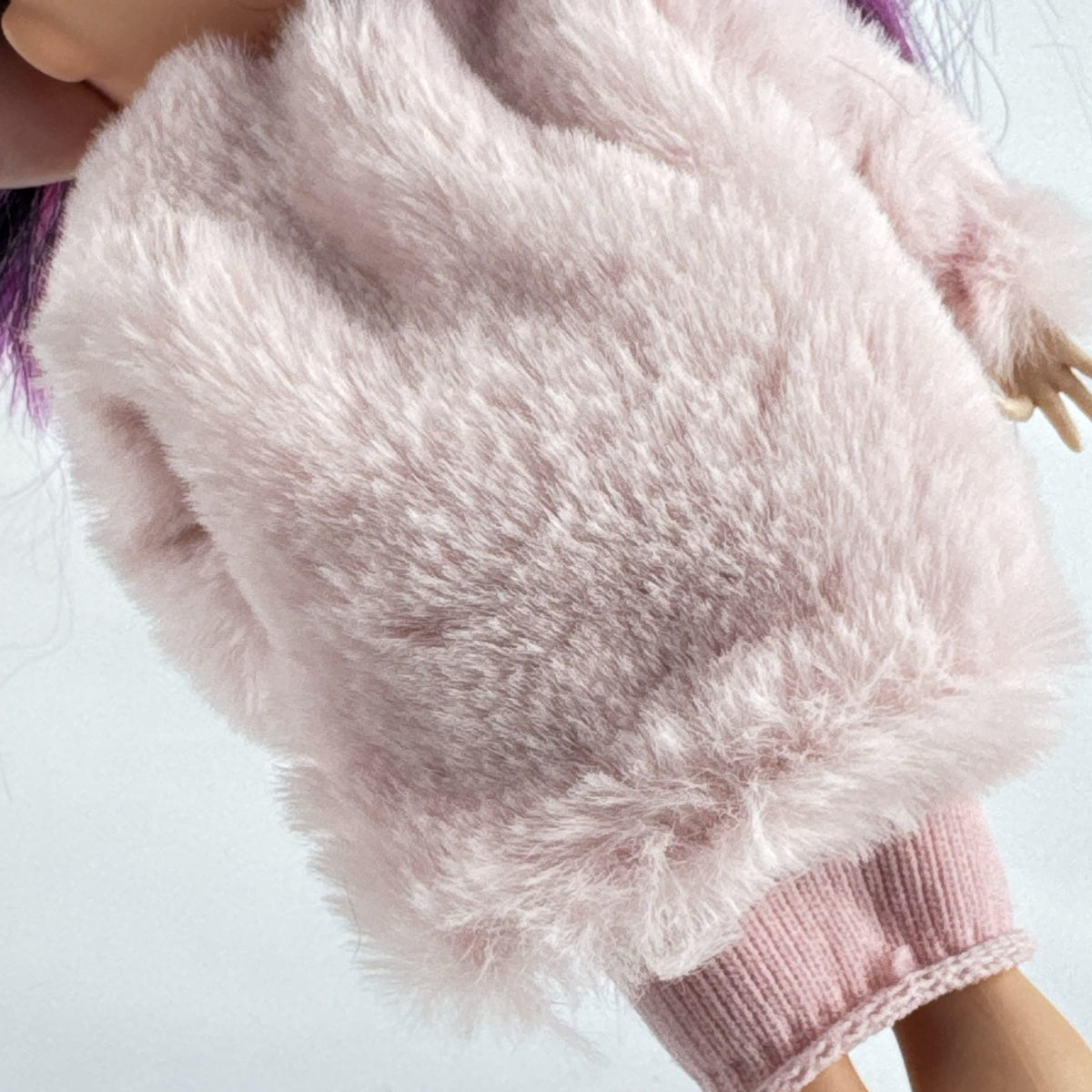 MGA L.O.L. Surprise! OMG Spirit Queen fashion doll with two-tone pink and black hair in a pink faux-fur coat