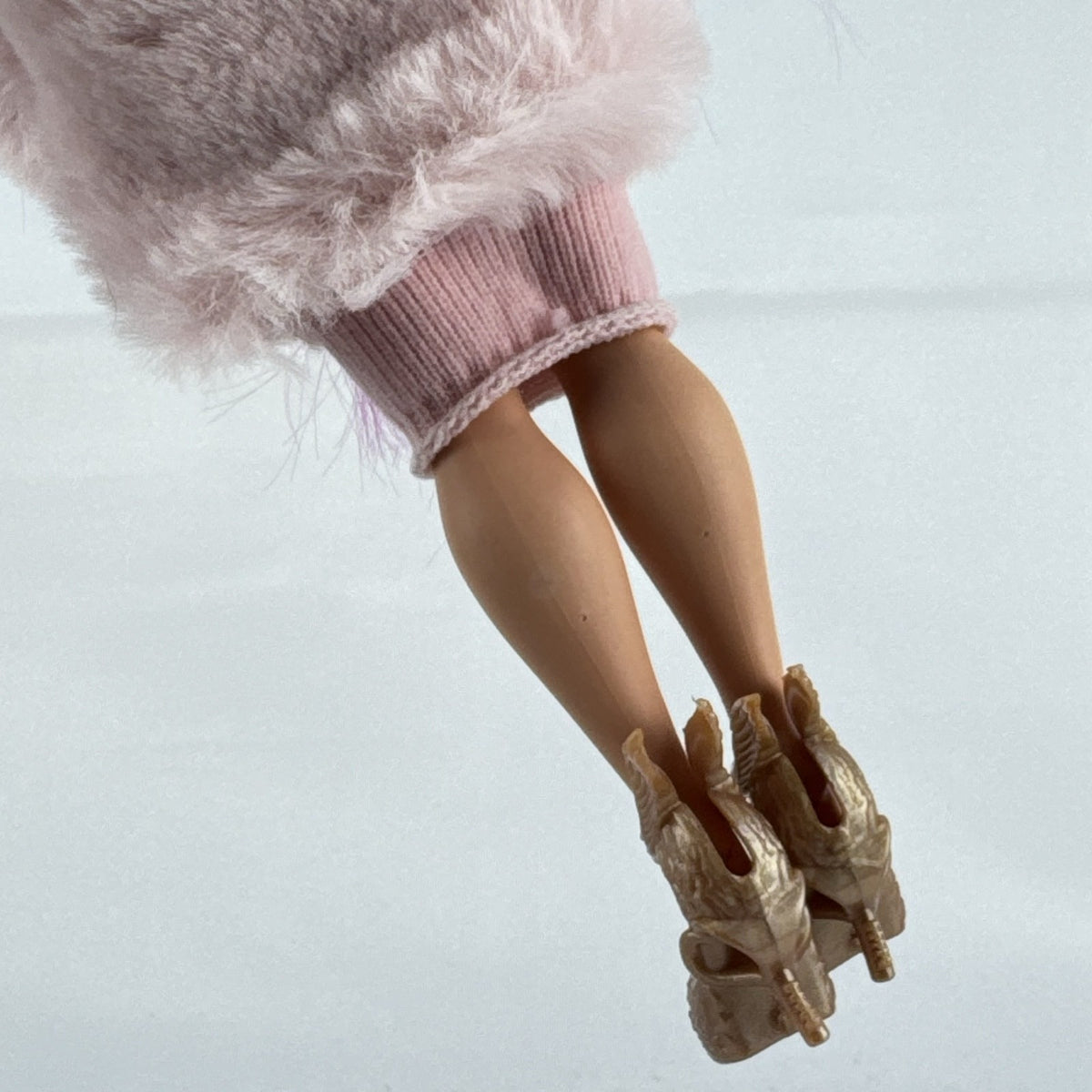 MGA L.O.L. Surprise! OMG Spirit Queen fashion doll with two-tone pink and black hair in a pink faux-fur coat