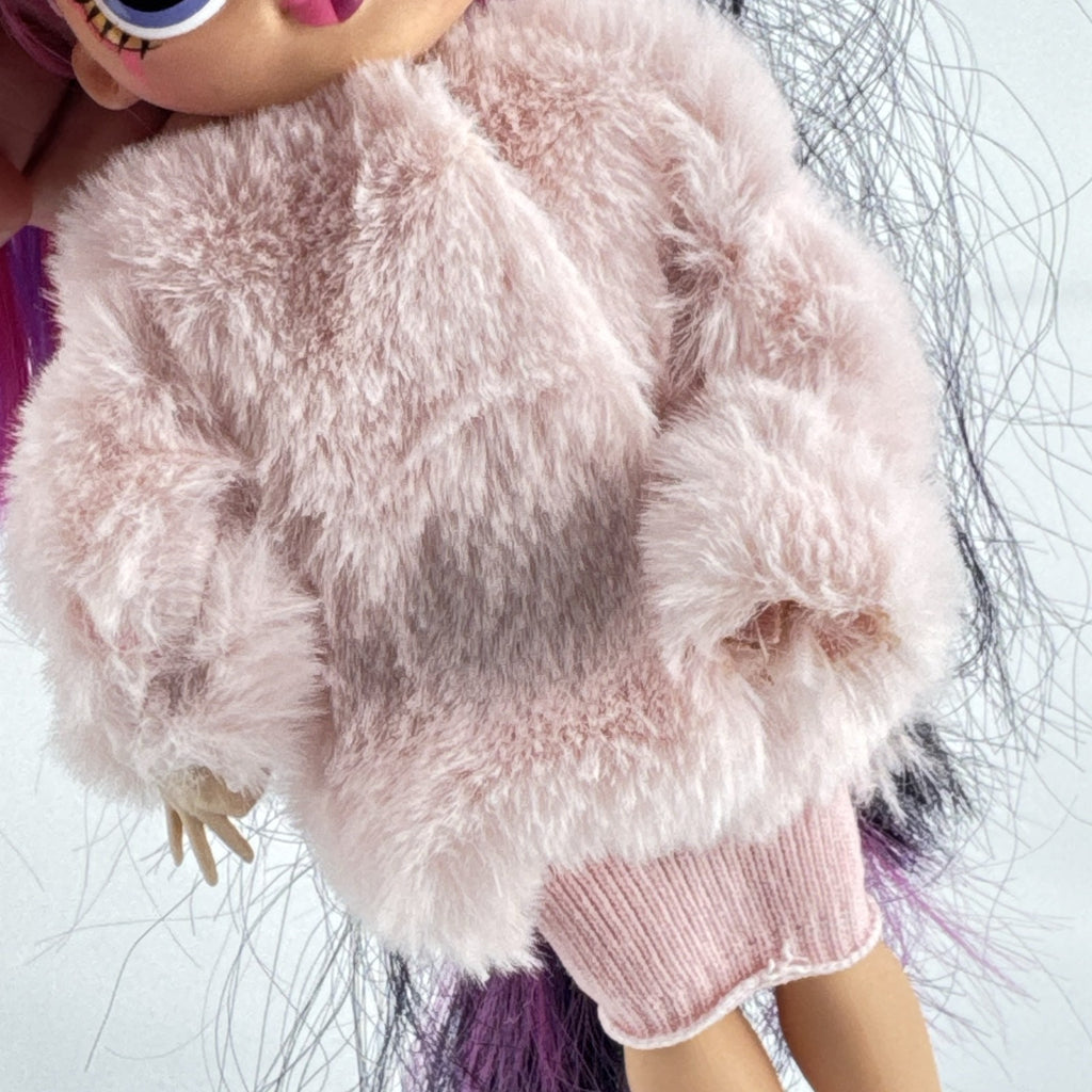 MGA L.O.L. Surprise! OMG Spirit Queen fashion doll with two-tone pink and black hair in a pink faux-fur coat