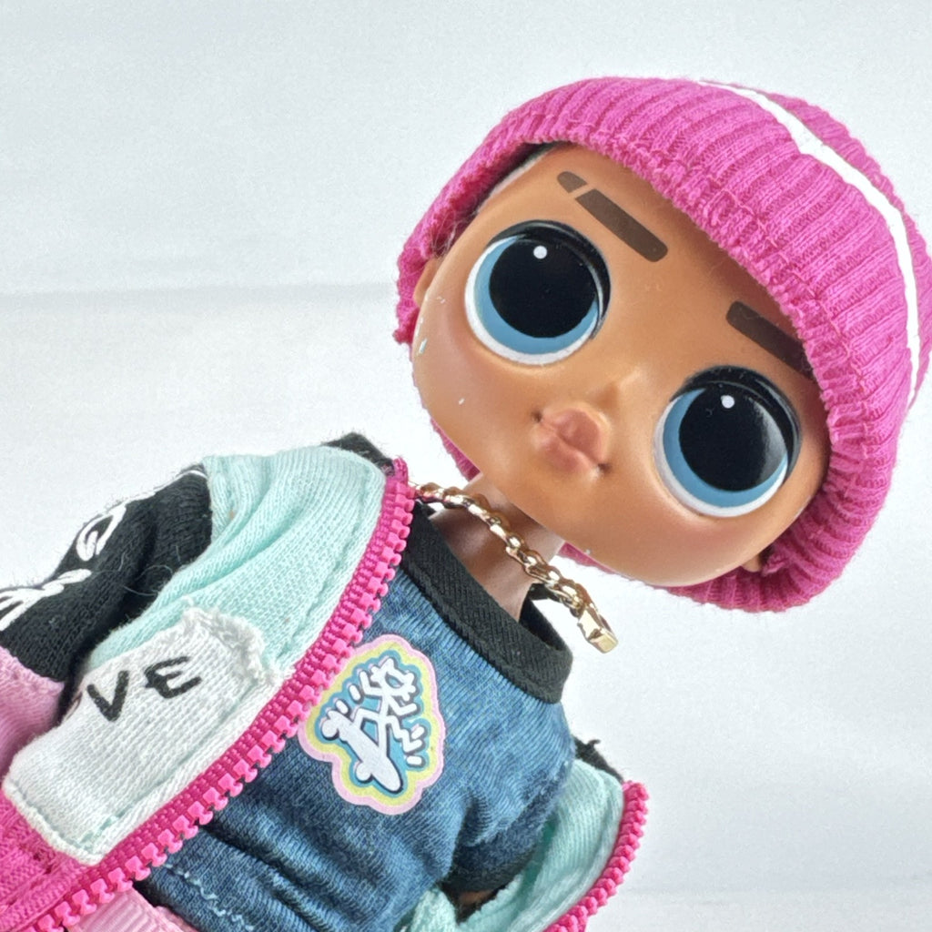 MGA L.O.L. Surprise! O.M.G. Guys Cool Lev 10-inch articulated boy fashion doll in layered streetwear and knit beanie