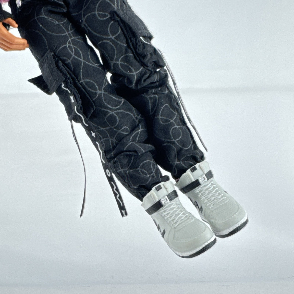MGA L.O.L. Surprise! O.M.G. Guys Cool Lev 10-inch articulated boy fashion doll in layered streetwear and knit beanie