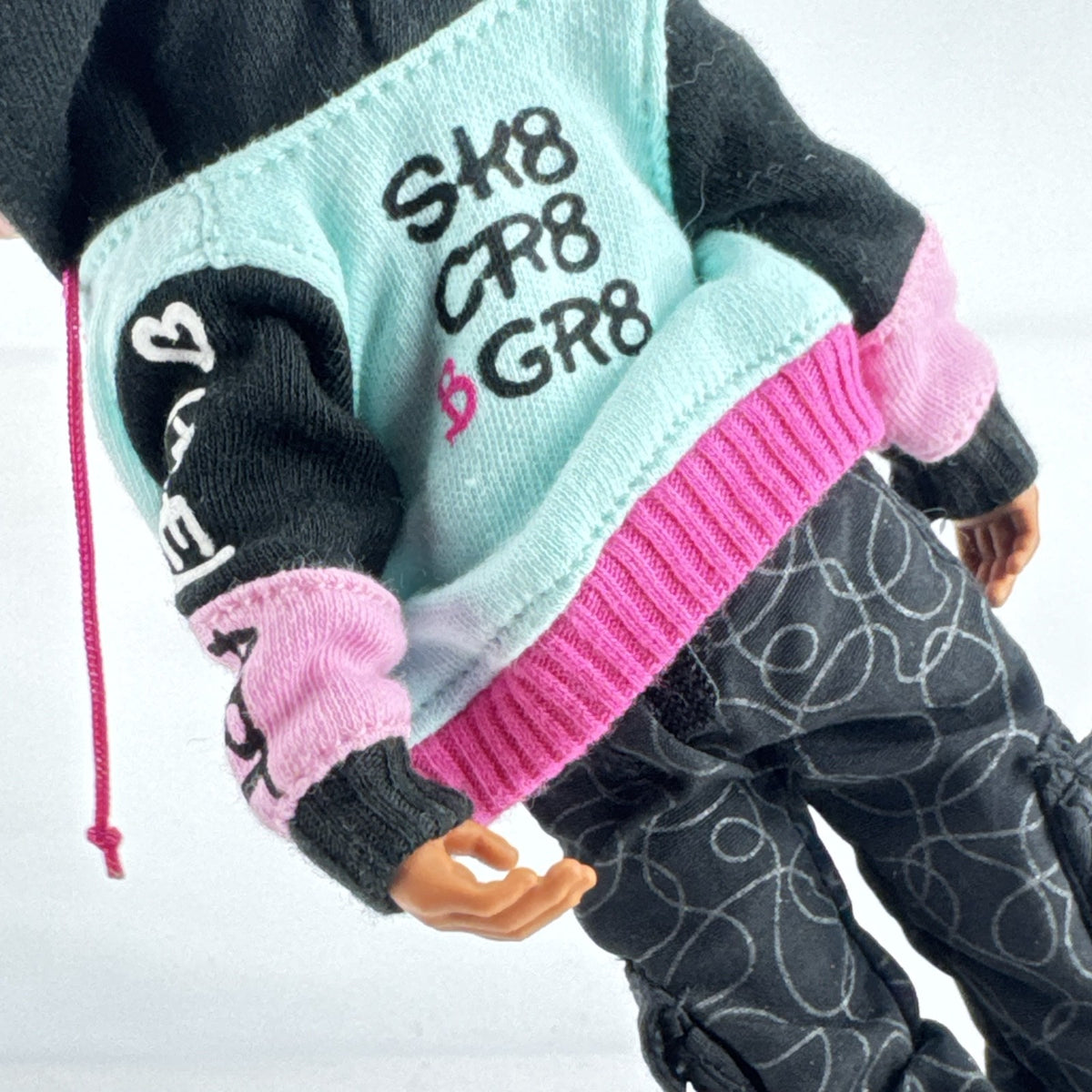 MGA L.O.L. Surprise! O.M.G. Guys Cool Lev 10-inch articulated boy fashion doll in layered streetwear and knit beanie