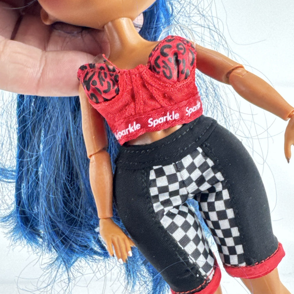 MGA L.O.L. Surprise! O.M.G. Downtown B.B. fashion doll with high blue ponytail and checkered shorts