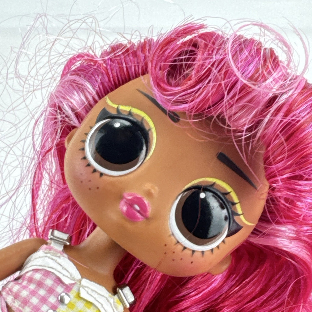 MGA L.O.L. Surprise! Tweens Fancy Gurl 6-inch fashion doll with pink hair and gingham outfit