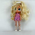 MGA L.O.L. Surprise Tweens Series 2 Goldie Twist doll wearing floral outfit, tights, and clear boots
