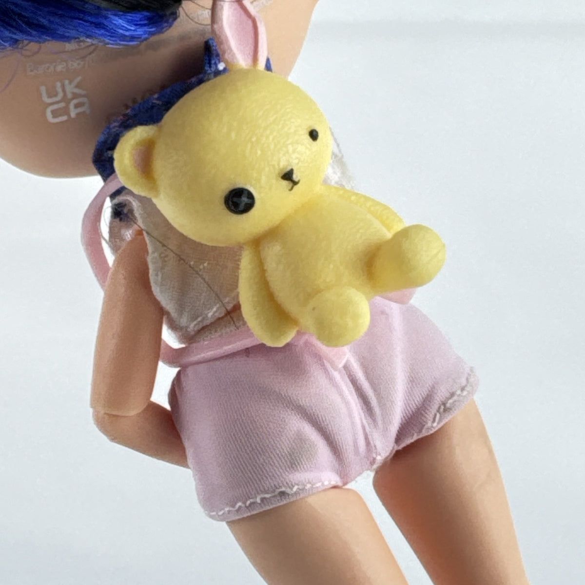 MGA L.O.L. Surprise Tweens Series 2 Aya Cherry fashion doll with blue hair, beret, and backpack