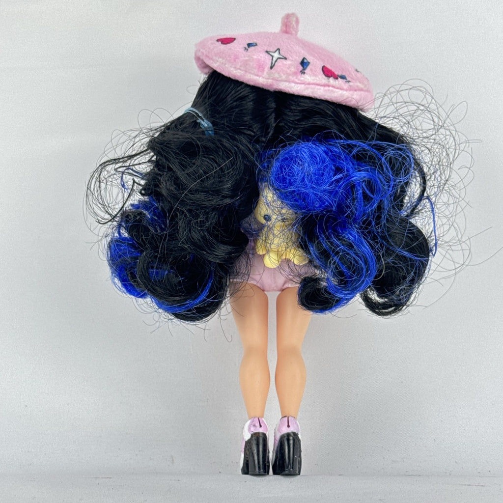 MGA L.O.L. Surprise Tweens Series 2 Aya Cherry fashion doll with blue hair, beret, and backpack
