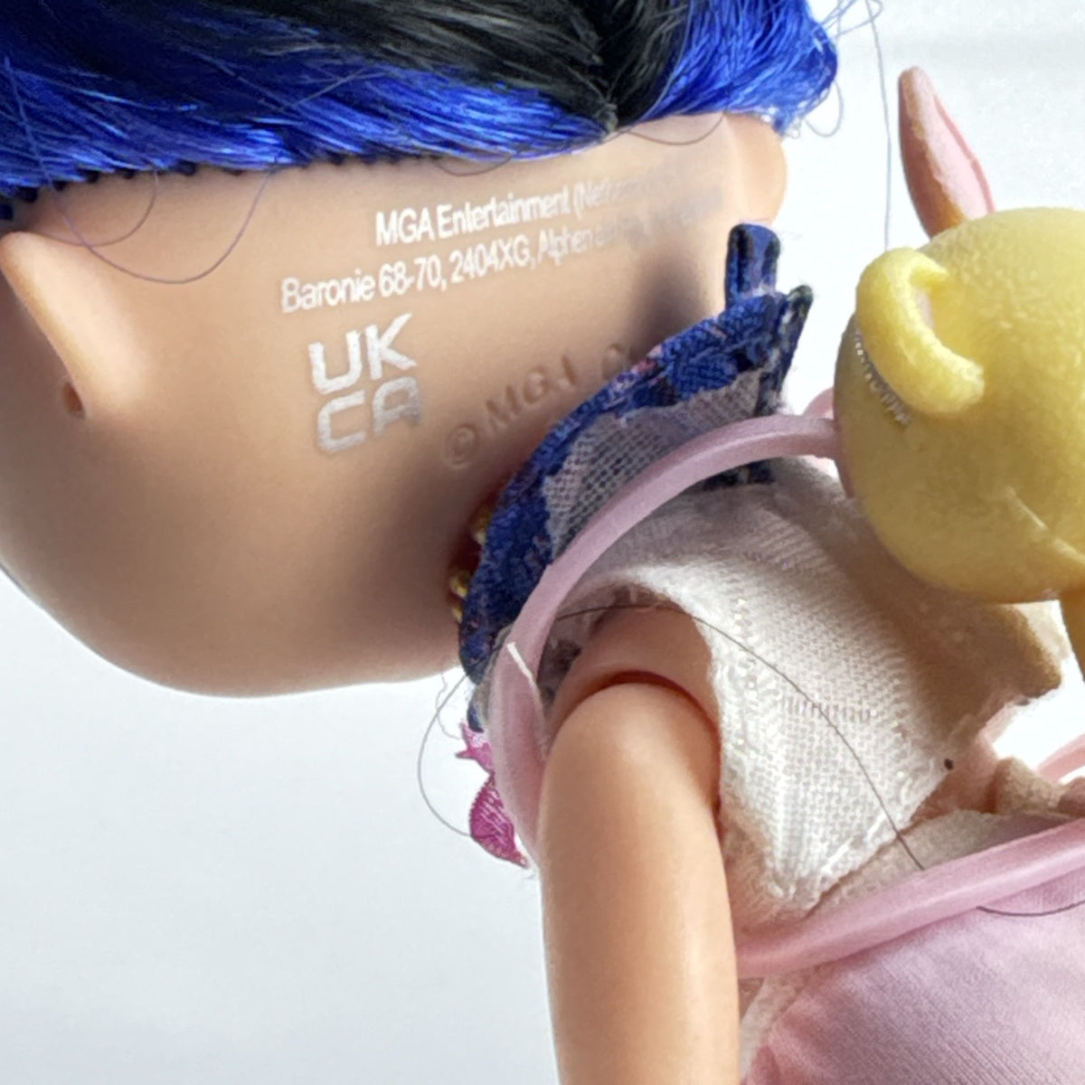 MGA L.O.L. Surprise Tweens Series 2 Aya Cherry fashion doll with blue hair, beret, and backpack
