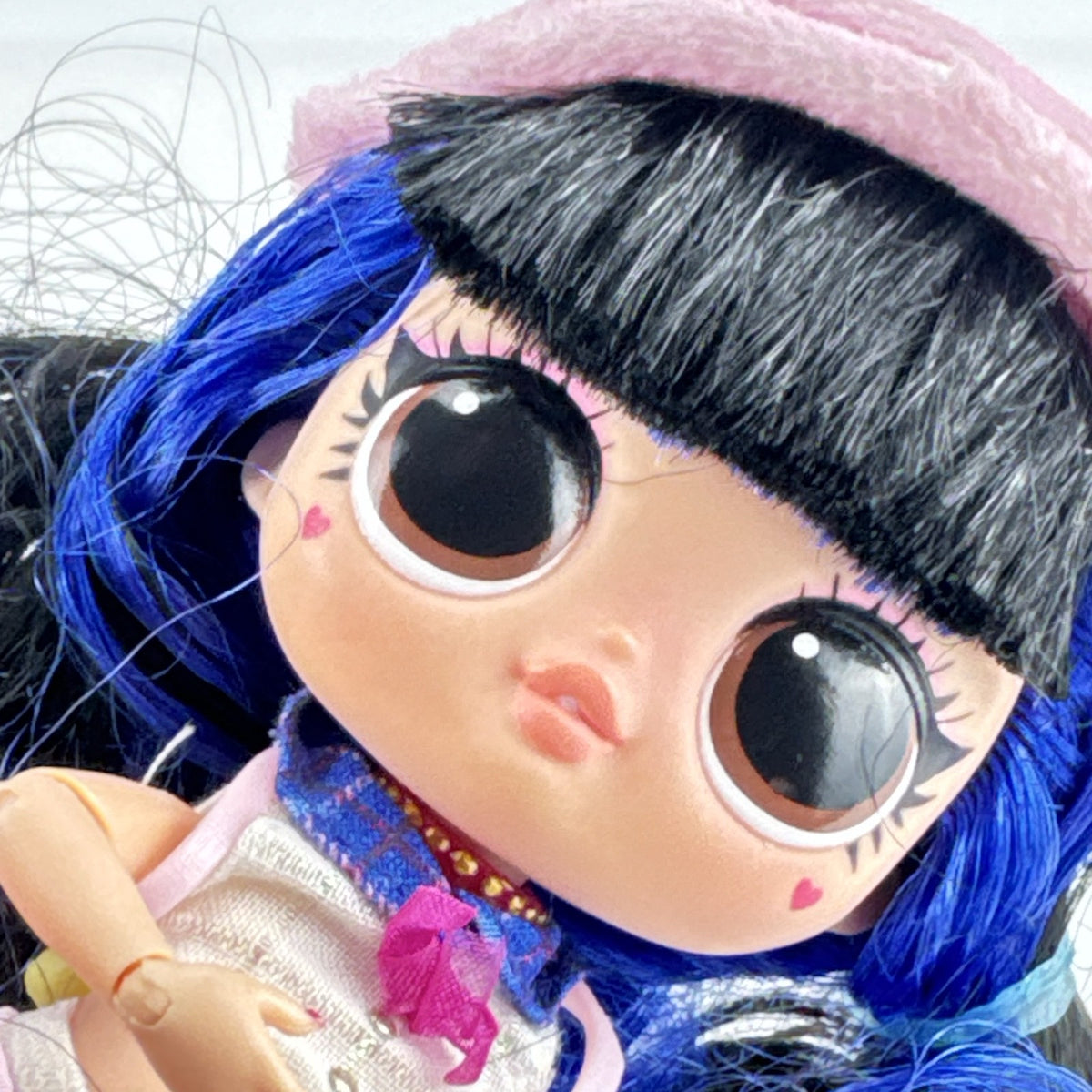MGA L.O.L. Surprise Tweens Series 2 Aya Cherry fashion doll with blue hair, beret, and backpack