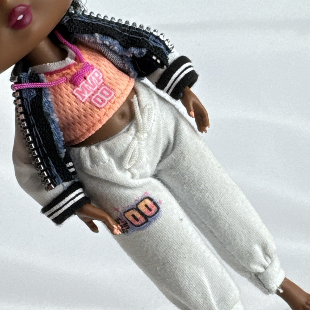 MGA Entertainment L.O.L. Surprise! Tweens Hoops Cutie fashion doll wearing varsity jacket and MVP athletic outfit