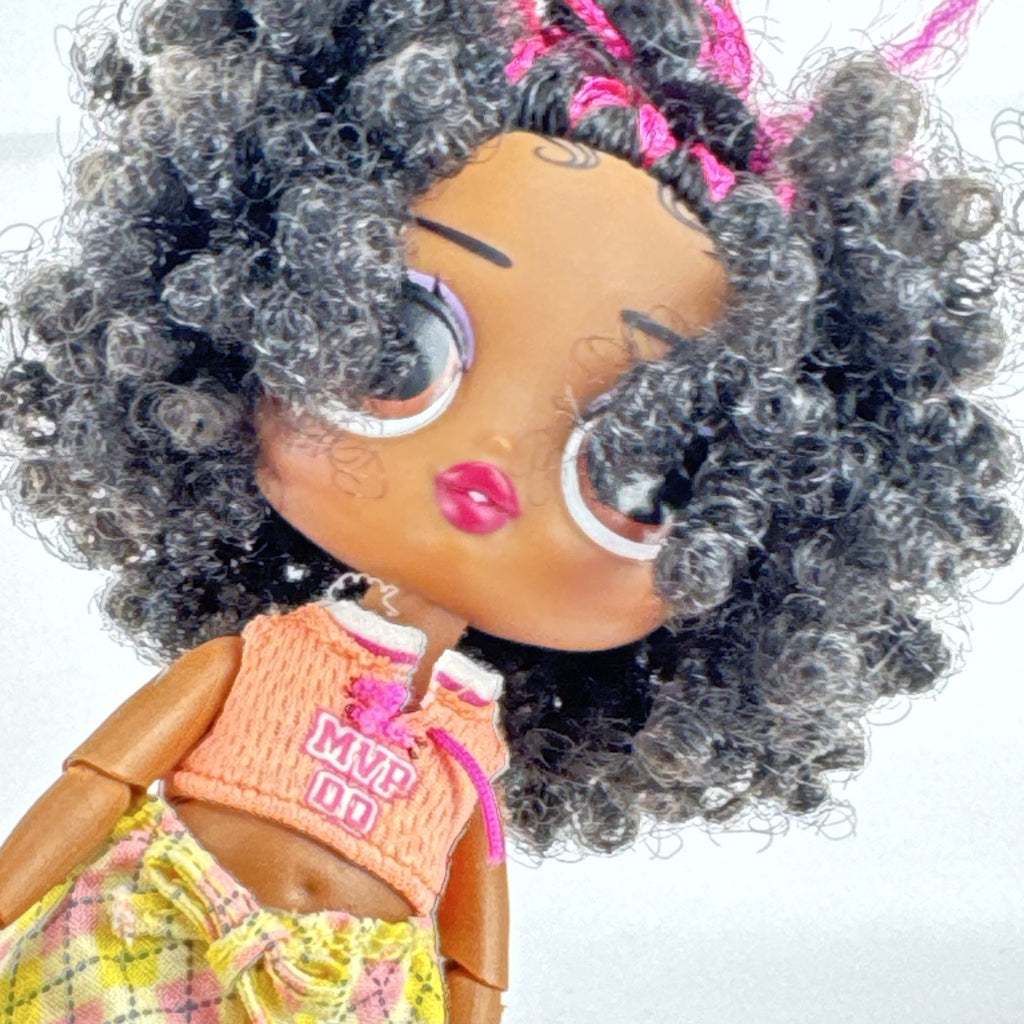 MGA Entertainment L.O.L. Surprise! Tweens Hoops Cutie 6-inch doll in argyle pants and pink boots with textured afro