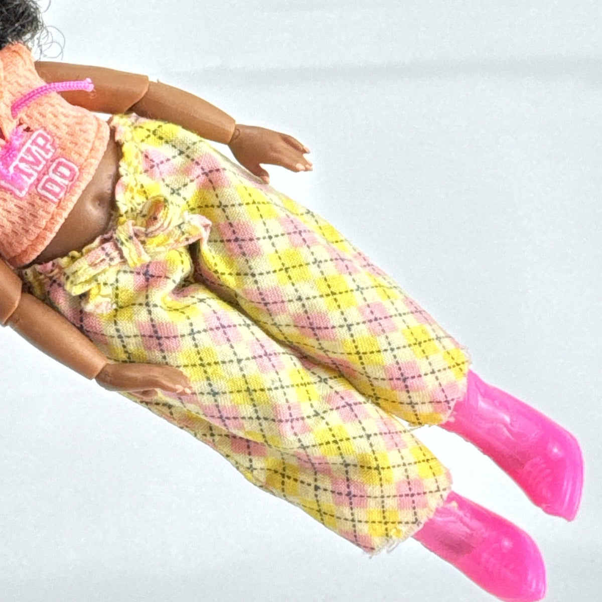 MGA Entertainment L.O.L. Surprise! Tweens Hoops Cutie 6-inch doll in argyle pants and pink boots with textured afro